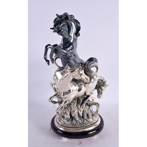 1624 - A LARGE EUROPEAN SILVER OVERLAID FIGURE OF HORSES. 3565 grams overall. 40 cm x 20 cm.