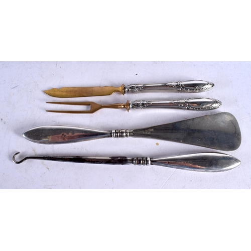 1632 - A CASED SET OF SILVER HANDLED FLATWARE together with a silver button hook cased set. 378 grams overa... 