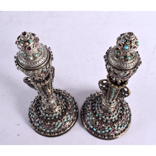 1649 - A PAIR OF 19TH CENTURY MIDDLE EASTERN INDIAN TURQUOISE AND RUBY REVERSIBLE CANDLESTICKS decorated al... 