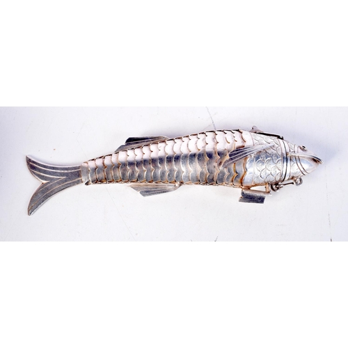 1654 - A 19TH CENTURY CONTINENTAL MIDDLE EASTERN ARTICULATED SILVER FISH of natualistic form. 149 grams. 17... 