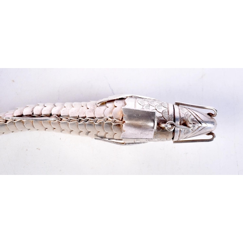 1654 - A 19TH CENTURY CONTINENTAL MIDDLE EASTERN ARTICULATED SILVER FISH of natualistic form. 149 grams. 17... 