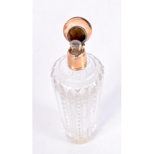 1658 - AN 18CT GOLD MOUNTED GLASS SCENT BOTTLE. 49 grams overall. 9 cm x 3 cm.