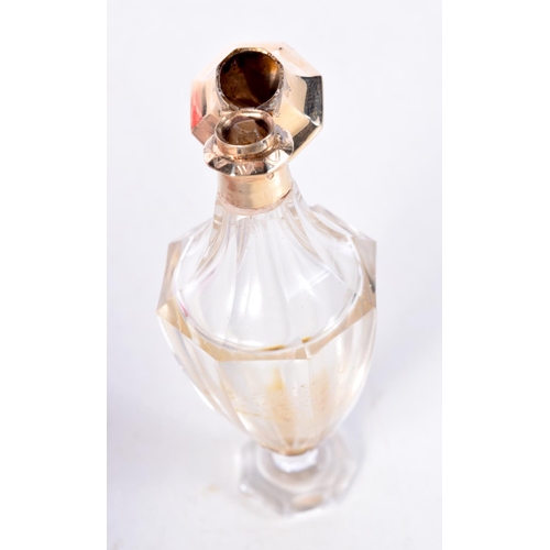 1673 - AN 18CT GOLD CRYSTAL GLASS SCENT BOTTLE. 52.9 grams overall. 10 cm x 3.5 cm.