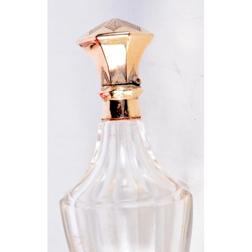 1673 - AN 18CT GOLD CRYSTAL GLASS SCENT BOTTLE. 52.9 grams overall. 10 cm x 3.5 cm.