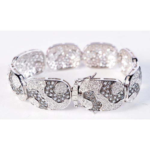 1695 - A SILVER CZ BRACELET. 38 grams. 20 cm long.