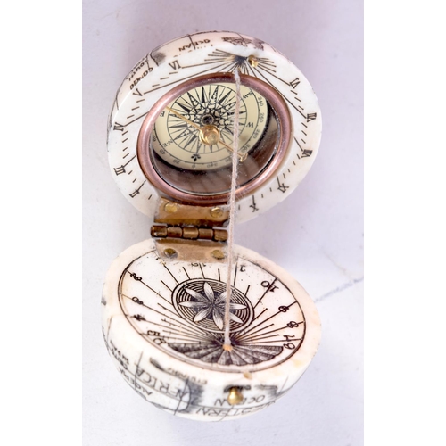 1704 - A BONE COMPASS. 4 cm wide.