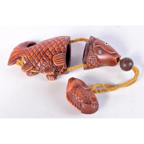 1708 - A JAPANESE CARVED WOOD FISH INRO. 11 cm x 5 cm.