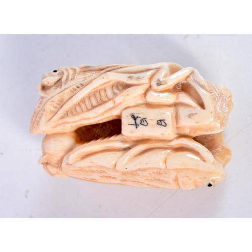 1714 - A JAPANESE CARVED BONE INSECT OKIMONO. 5 cm x 3 cm.