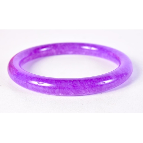 1721 - A CHINESE JADE BANGLE. 36 grams. 6 cm diameter.