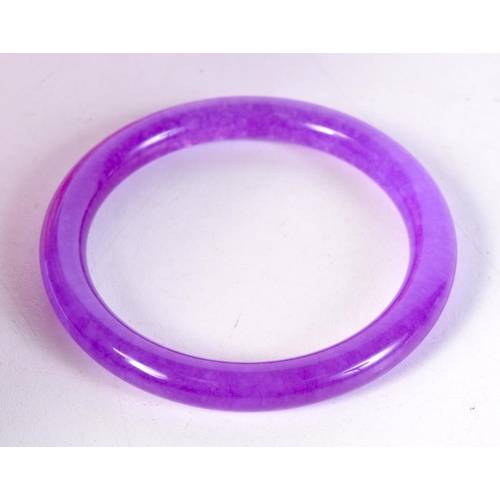 1721 - A CHINESE JADE BANGLE. 36 grams. 6 cm diameter.