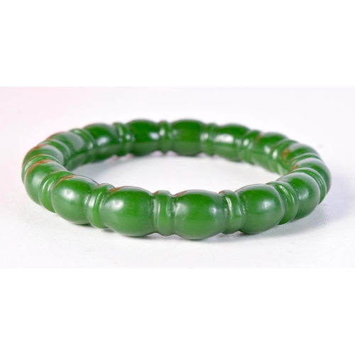 1722 - A CHINESE JADE BANGLE. 5.5 cm wide.