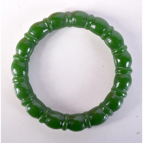 1722 - A CHINESE JADE BANGLE. 5.5 cm wide.