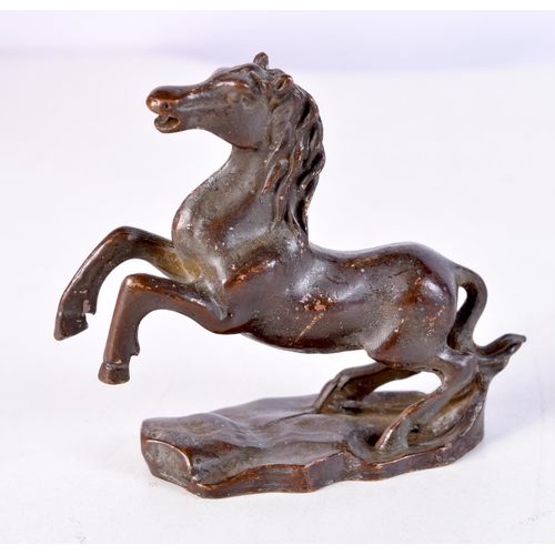 1723 - A JAPANESE BRONZE HORSE. 7.5 cm x 6.25 cm.