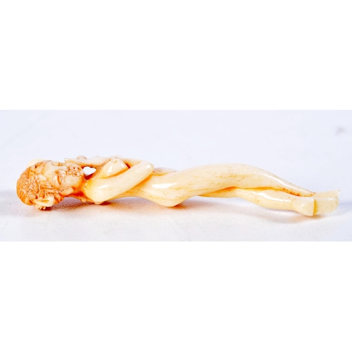 1734 - A JAPANESE BONE MEDICINE DOLL. 5.8 grams. 6.5 cm x 1.5 cm.