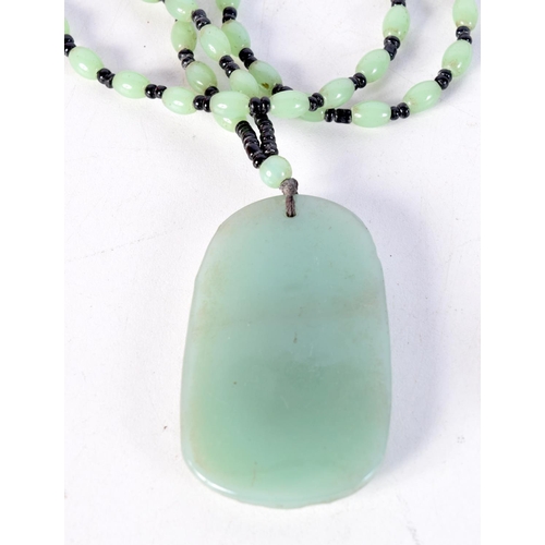 1735 - A CHINESE HARDSTONE NECKLACE. 88 grams. 64 cm long.