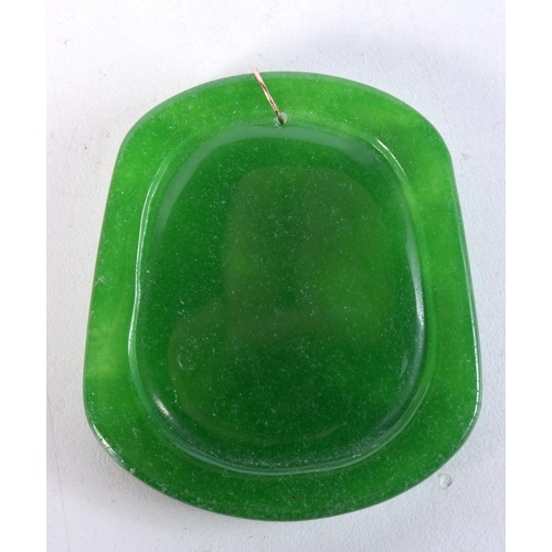 1762 - A CHINESE JADE PENDANT. 5.5 cm x 4.75 cm.