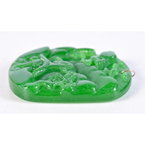 1762 - A CHINESE JADE PENDANT. 5.5 cm x 4.75 cm.