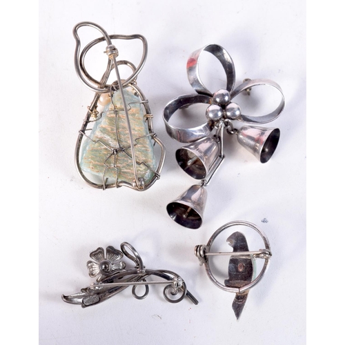 1769 - FOUR SILVER BROOCHES. 37.5 grams overall. Largest 5.25 cm x 3 cm. (4)