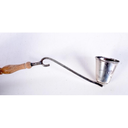 1797 - A TIFFANY & CO SILVER CANDLE SNUFFER. 30 cm long.