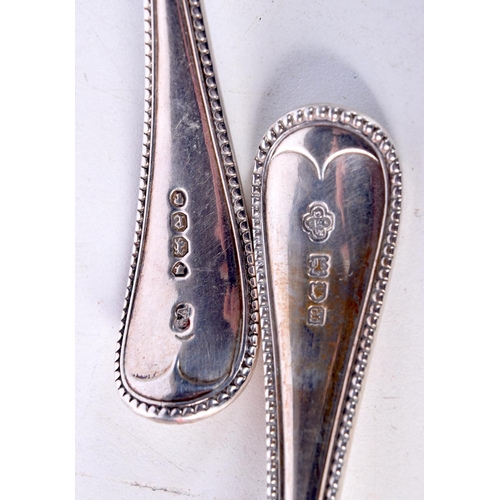 1803 - TWO SILVER SIFTING SPOONS. London 1860 & 1902. 115 grams. 15 cm x 4.5 cm. (2)