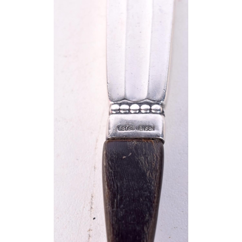 1807 - THREE DANISH GEORG JENSEN SILVER MOUNTED HORN CUTLERY. 84 grams overall. 18 cm x 3 cm. (3)