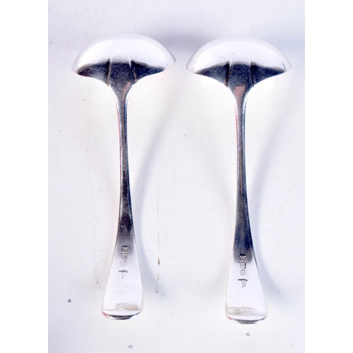 1809 - A PAIR OF EDWARDIAN SILVER LADLES. 143 grams. 17.5 cm x 6 cm.