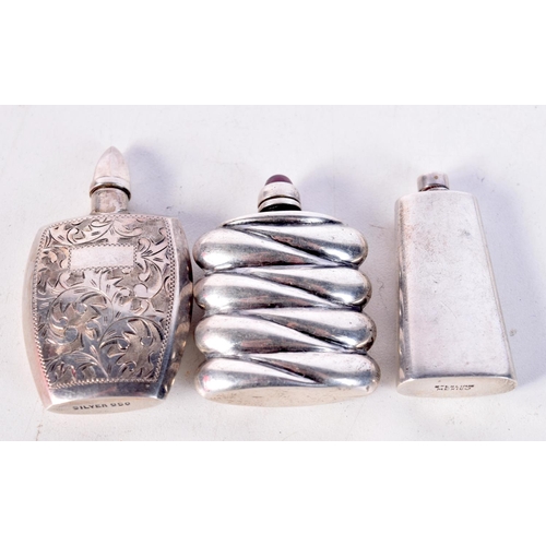 1811 - THREE SILVER SCENT BOTTLES. 36 grams. 5.5 cm x 3 cm. (3)