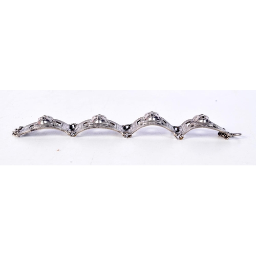 1825 - AN ART DECO WHITE METAL EGYPTIAN REVIVAL WHITE METAL BRACELET. 40 grams. 15.5 cm long.