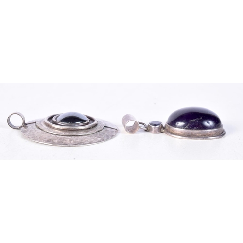 1829 - TWO DESIGNER VINTAGE SILVER PENDANTS. 35 grams. Largest 5.25 cm x 4.5 cm. (2)