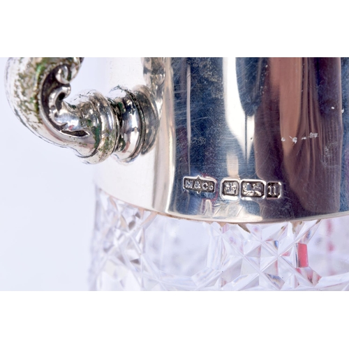 1844 - AN EDWARDIAN SILVER AND CUT GLASS CLARET JUG. Sheffield 1905. 1057 grams inc glass. 25.5 cm x 16.5 c... 