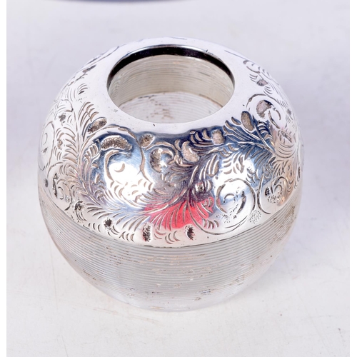 1848 - AN ART DECO SILVER SUGAR SIFTER together with a silver and cut glass pepperette & a silver mounted m... 