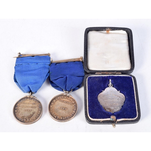 1856 - A PAIR OF HMS WORCESTER & CONWAY SILVER BOAT RACE MEDALS together with a silver and enamel medallion... 