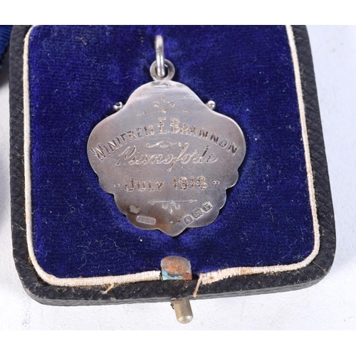 1856 - A PAIR OF HMS WORCESTER & CONWAY SILVER BOAT RACE MEDALS together with a silver and enamel medallion... 