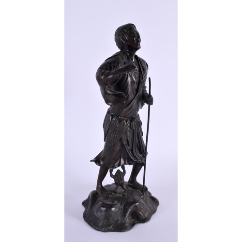 2003 - A 19TH CENTURY JAPANESE MEIJI PERIOD OKIMONO OF A MALE modelled holding a staff with a clambering to... 