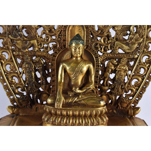 2009 - A LARGE CHINESE TIBETAN BRONZE BUDDHISTIC SHRINE 20th Century, modelled with a seated buddha upon a ... 