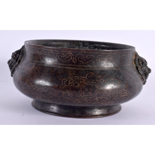 2013 - A CHINESE TWIN HANDLED BRONZE CENSER 20th Century, silver inlaid with landscapes. 17 cm wide, intern... 