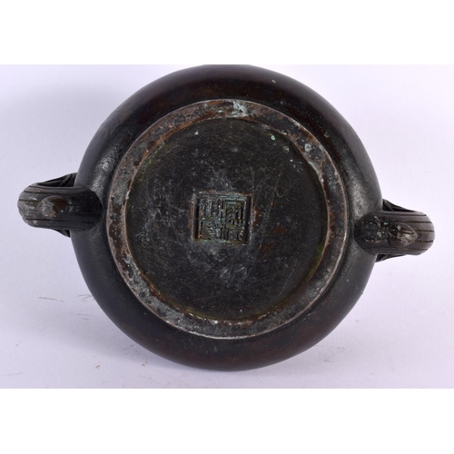 2014 - A CHINESE TWIN HANDLED BRONZE CENSER 20th Century. 18 cm wide, internal with 9 cm.