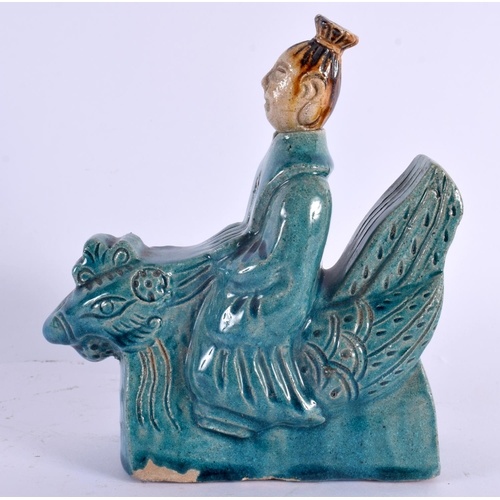 2017 - A 19TH CENTURY CHINESE TURQUOISE GLAZED POTTERY FIGURE Qing, modelled seated upon a bird. 16 cm x 12... 