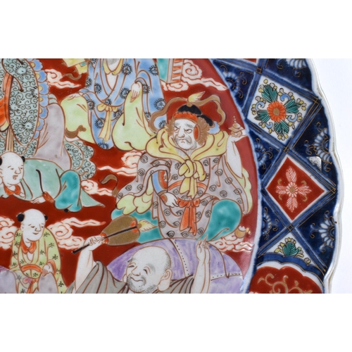 2020 - A LARGE 19TH CENTURY JAPANESE MEIJI PERIOD IMARI CHARGER painted with figures in landscapes. 39 cm w... 