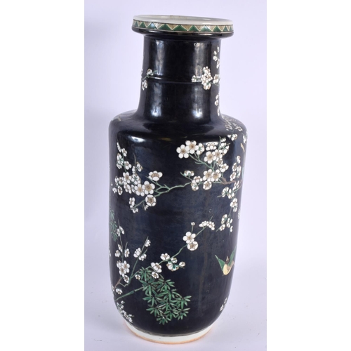 2021 - A LARGE 19TH CENTURY CHINESE FAMILLE NOIRE PORCELAIN ROULEAU VASE Kangxi style, painted with foliage... 