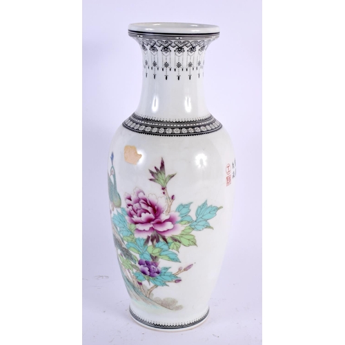 2024 - A CHINESE REPUBLICAN PERIOD FAMILLE ROSE PORCELAIN VASE painted with birds and foliage. 26 cm high.