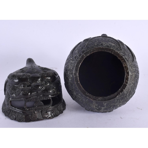 2025 - A 19TH CENTURY CHINESE METAL BUDDHISTIC LION INCENSE BURNER AND COVER Qing. 13 cm x 6 cm.