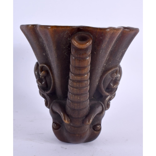 2032 - A CHINESE CARVED BUFFALO HORN TYPE LIBATION CUP 20th Century. 426 grams. 10 cm x 12 cm.