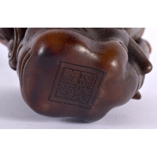 2032 - A CHINESE CARVED BUFFALO HORN TYPE LIBATION CUP 20th Century. 426 grams. 10 cm x 12 cm.