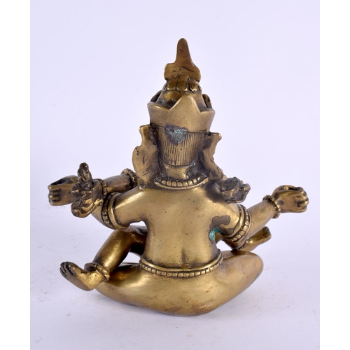 2059 - AN 18TH/19TH CENTURY INDIAN TIBETAN BRONZE BUDDHISTIC FIGURE of erotic form. 14 cm x 8 cm.