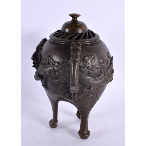 2063 - A LARGE JAPANESE TAISHO PERIOD BRONZE CENSER AND COVER overlaid in relief with dragons. 26 cm x 18 c... 