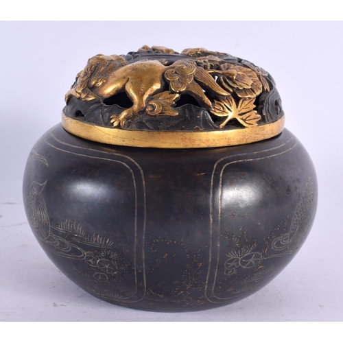 2066 - A CHINESE SILVER INLAID BRONZE CENSER AND COVER 20th Century. 13 cm diameter.