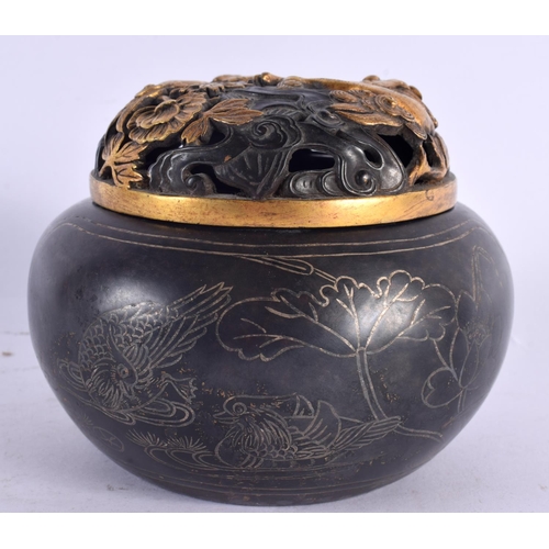 2066 - A CHINESE SILVER INLAID BRONZE CENSER AND COVER 20th Century. 13 cm diameter.