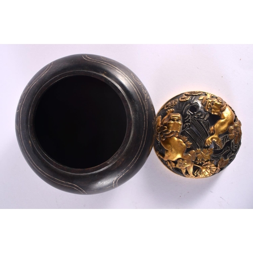 2066 - A CHINESE SILVER INLAID BRONZE CENSER AND COVER 20th Century. 13 cm diameter.