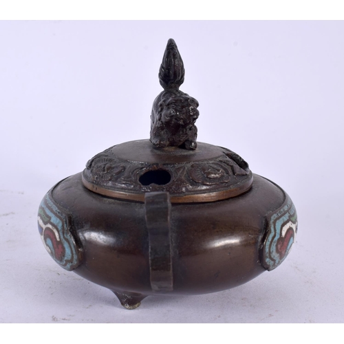 2067 - A 19TH CENTURY JAPANESE MEIJI PERIOD CHAMPLEVE ENAMEL CENSER AND COVER decorated with mask heads. 9.... 